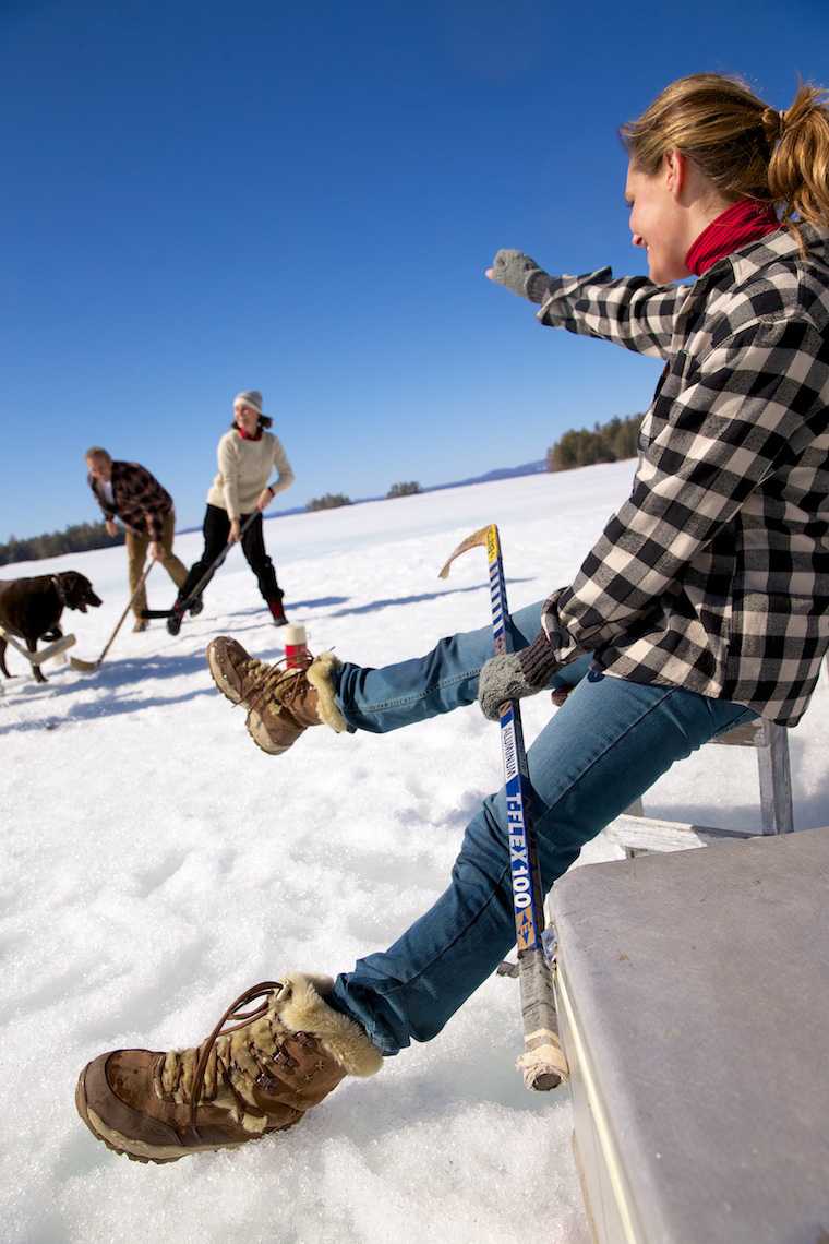 Hockey on a frozen lake with friends.