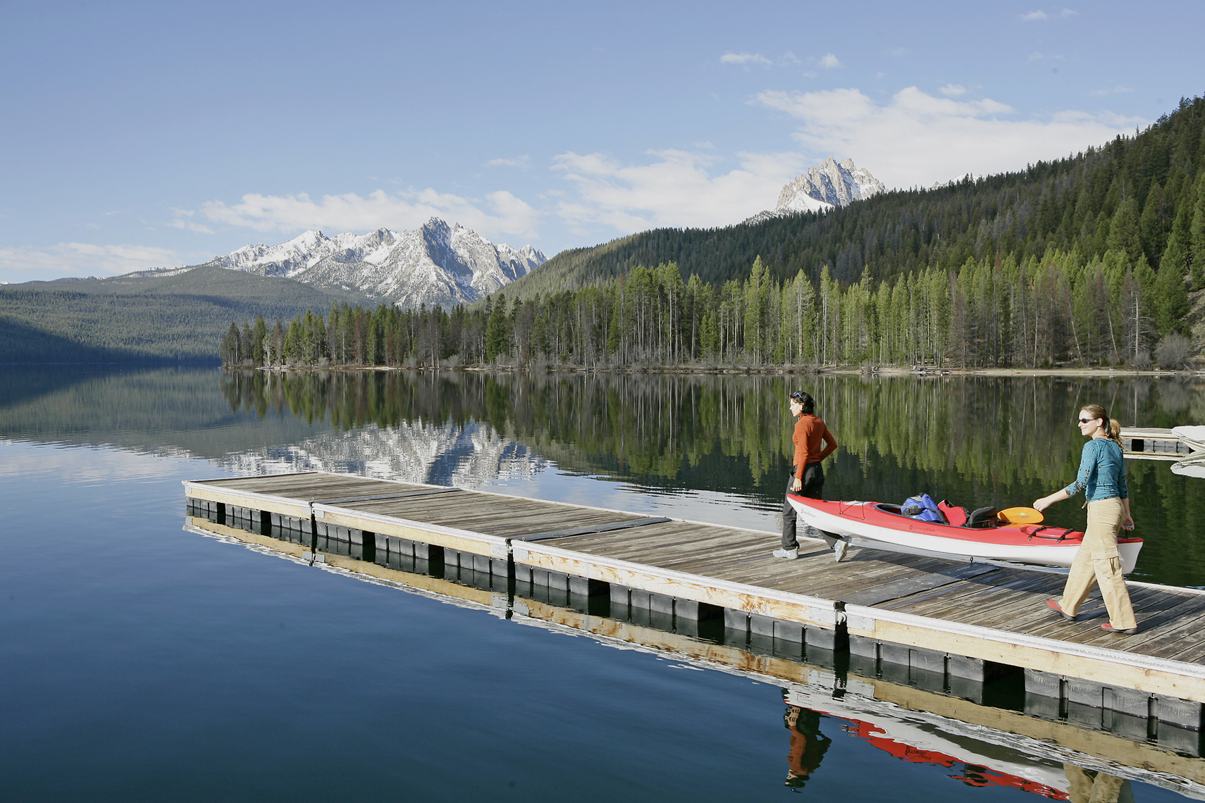 Launching kayak in Idaho Lake/Steve Mason Photography